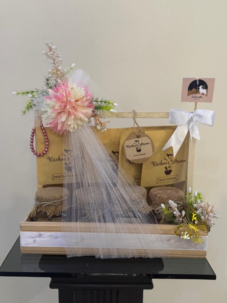 Wooden gift crate with masala pouches and jars